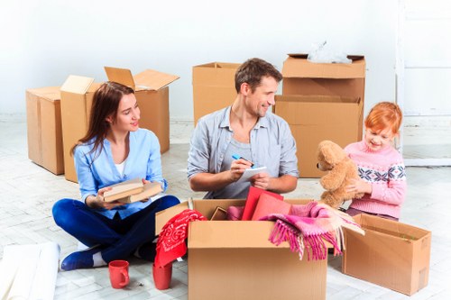 Office relocation planning in Edmonton with labeled moving boxes