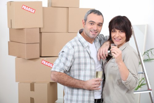 Worker using equipment safely while moving stored items